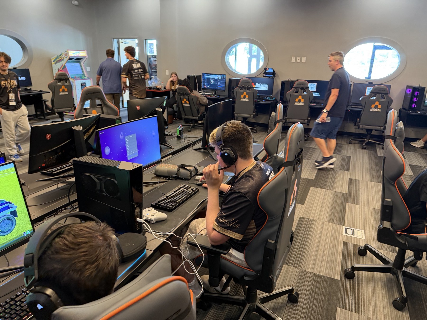 STORM players practicing in an esports facility