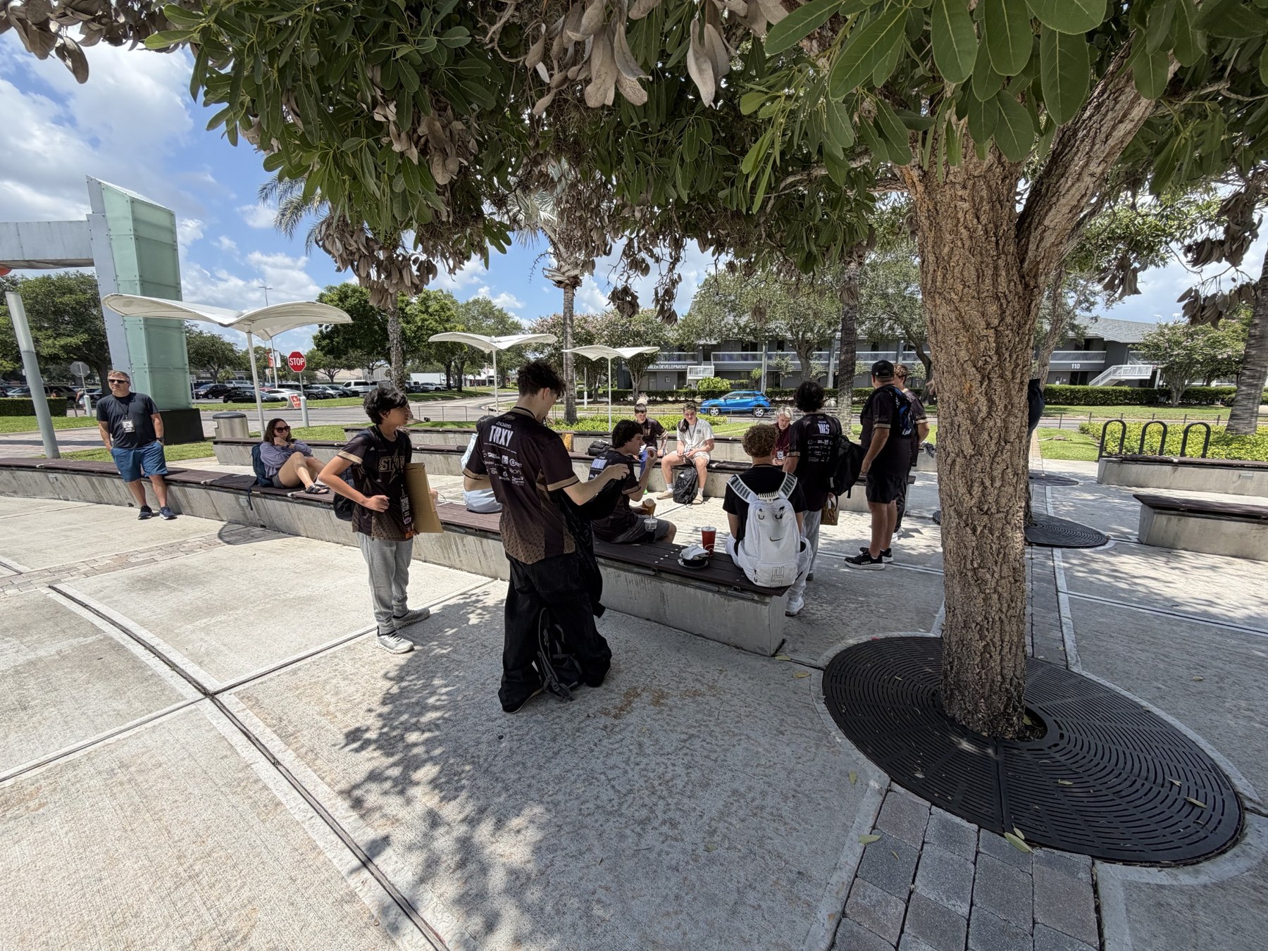 STORM players and families gathered outdoors during a team break